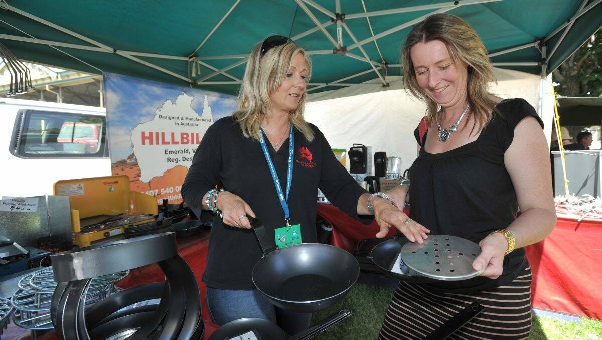 VARIETY: Belinda Mills from Hillbilly Camping in Emerald shows her wares to Strathfieldsaye’s Janine Butcher. Picture: JULIE HOUGH