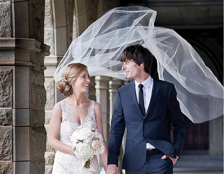 GOING: A gust of wind grabs Jacqueline Ferris' wedding veil. Picture: TERRI BASTEN