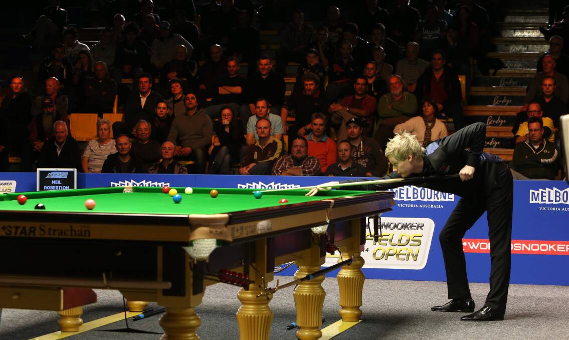 Neil Robertson lines up a shot during his quarter-final victory over Joe Perry.