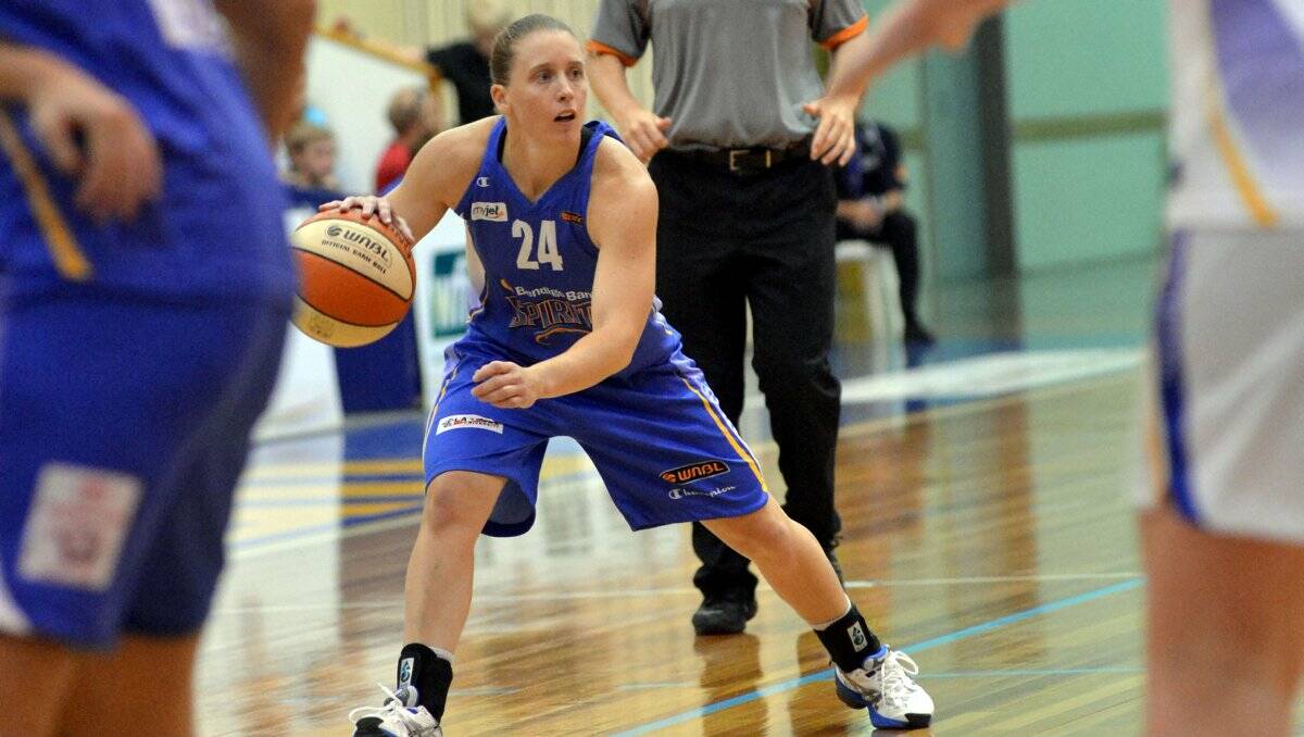 DETERMINATION: Bendigo Spirit guard Jane Chalmers looks to pass the basketball in last night's home-court win against the Sydney Flames. Picture: BRENDAN McCARTHY
