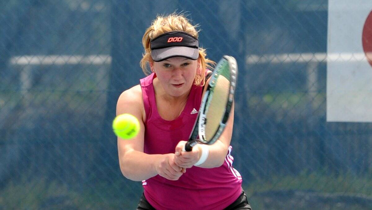 TOP SHOT: Knowsley tennis ace Eliza Long hits a backhand winner. Picture: JULIE HOUGH 