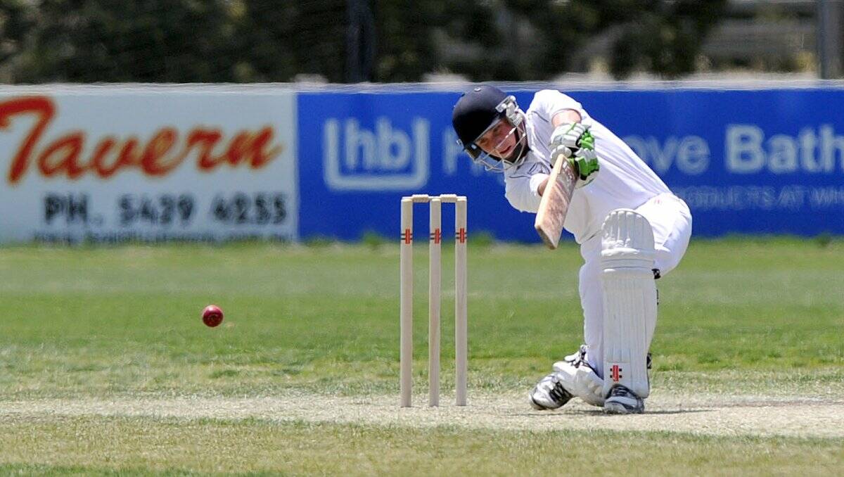 crunch: Sandhurst opener Isaac Conway hits through the off-side during his innings of 20 on Saturday against Strathfieldsaye.  Picture: JULIE HOUGH