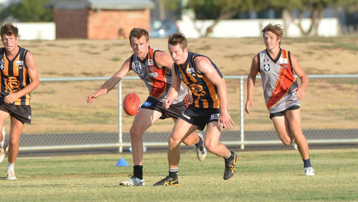 SKILFUL: Lee Coghlan leads in the race for the ball in Bendigo Gold's intra-club match at Epsom. Picture: PETER WEAVING 
