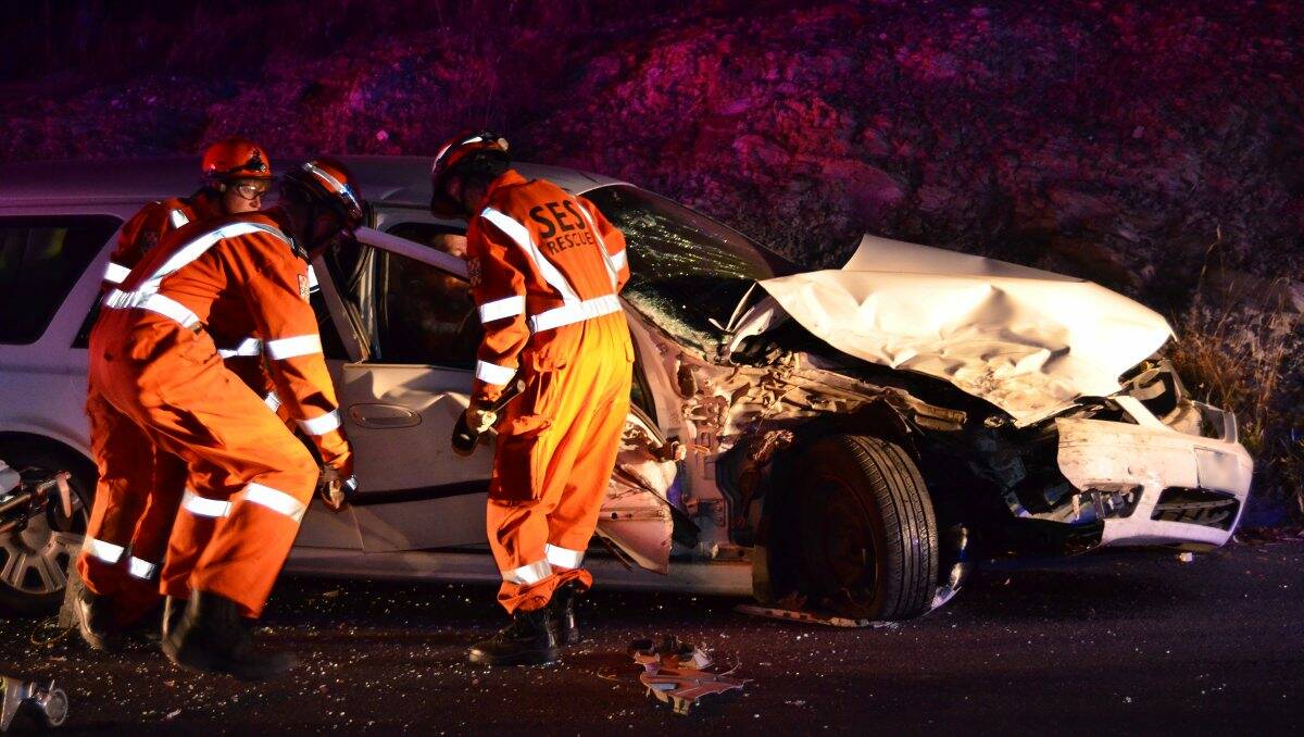 Emergency service workers at the scene of a car crash in Golden Square on Christmas Eve.