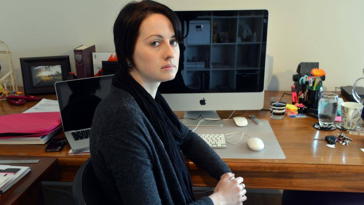 CUT off: Graphic designer Morgan Macdonald is finding work difficult with no phone line. 
