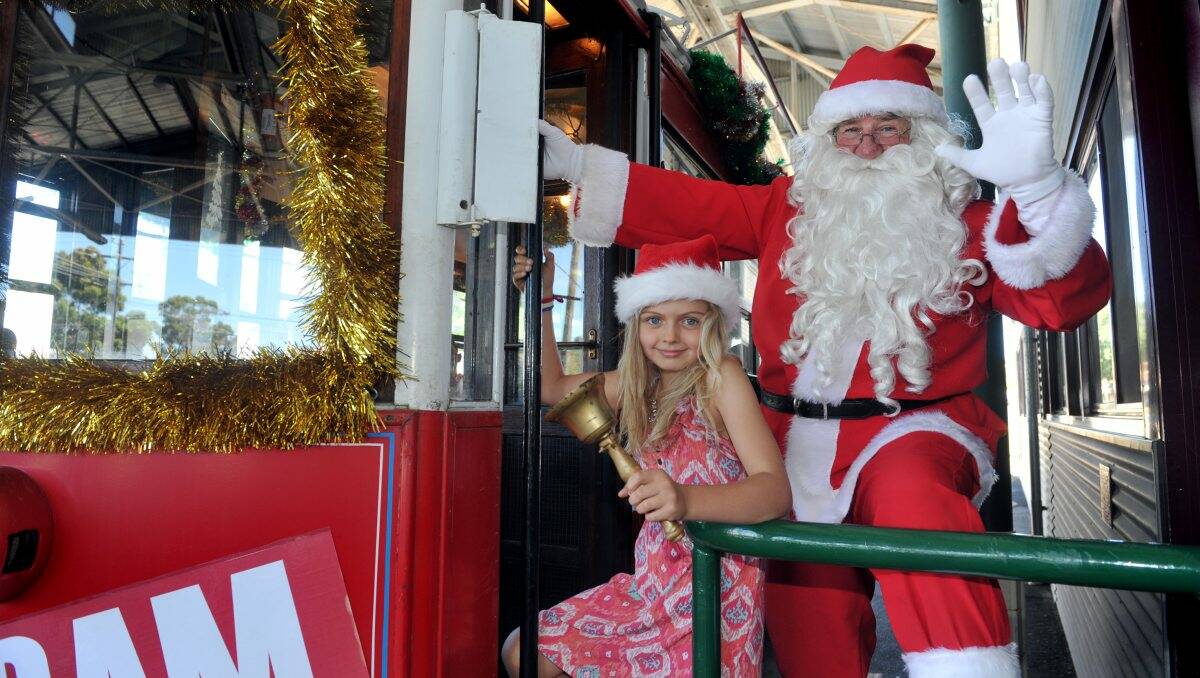 Seven-year-old Laura Power at the Santa Tram.