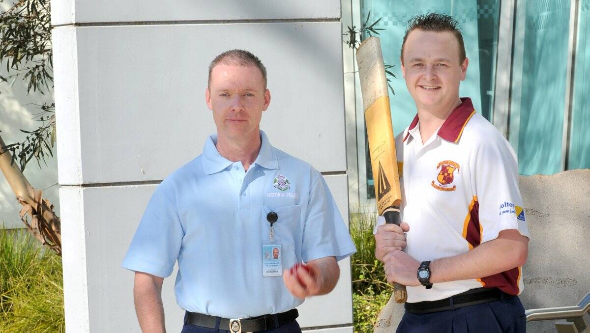 On-FIELD RIVALRY: Sergeant Mick McCrann and Constable Dave Becker. 