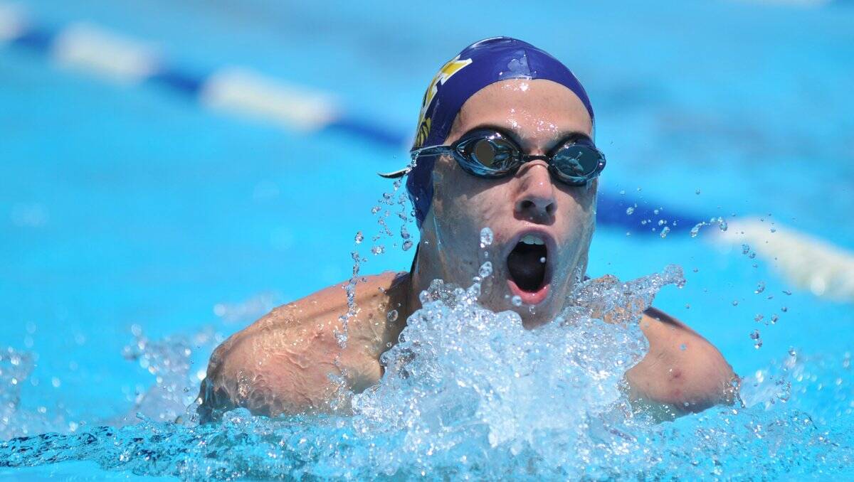 FINE STYLE: Andrew Dessens from Bendigo Hawks Aquatic competes in the 14-and-over 50m breast-stroke in yesterday’s meet at Bendigo Aquatic Centre. Picture: JULIE HOUGH