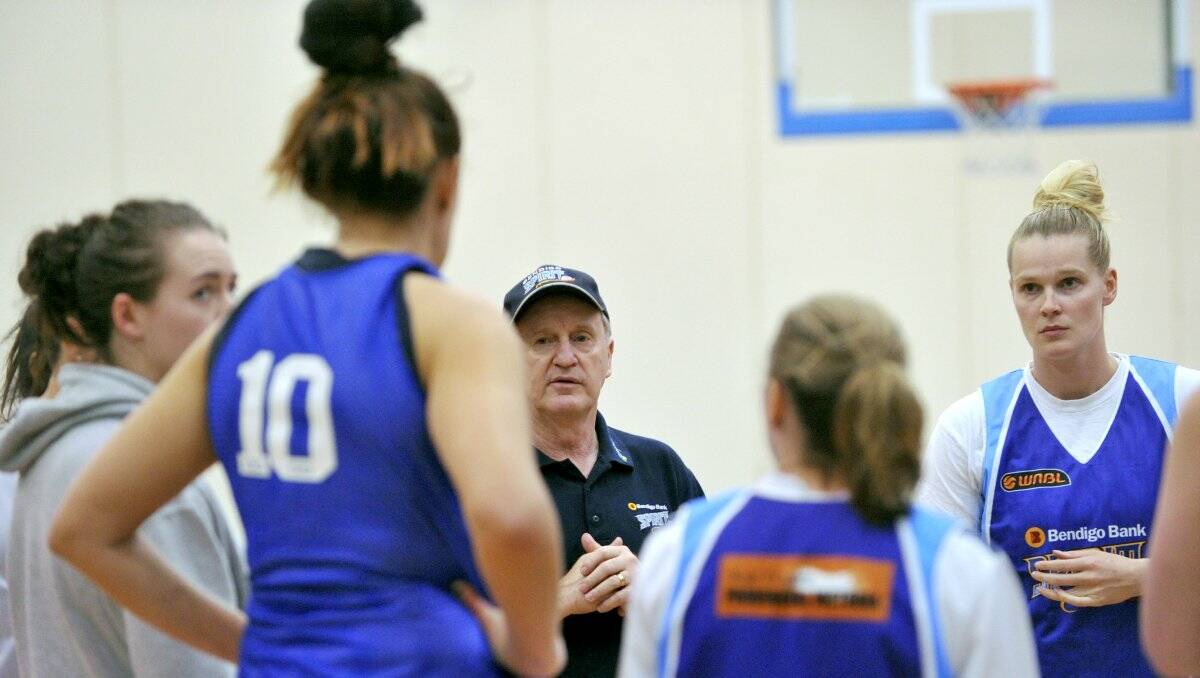 TALKING TACTICS: Coach Bernie Harrower gives instructions at a Spirit training session. Picture: JODIE DONNELLAN 