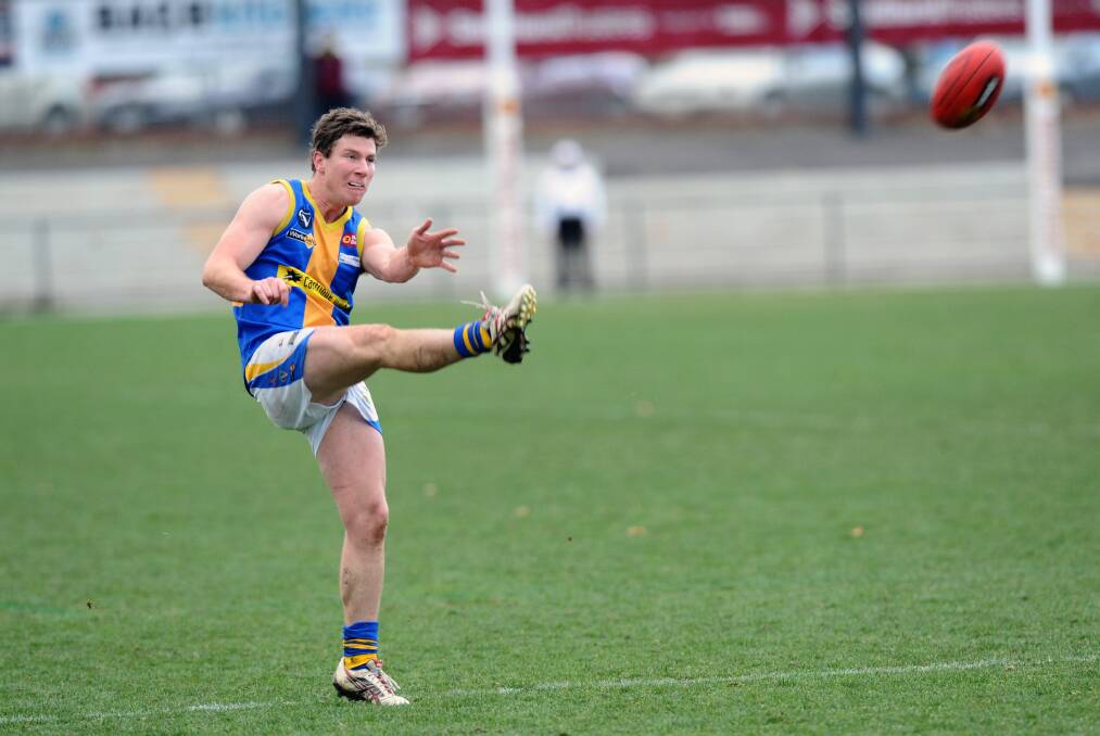 ANOTHER GOAL: Golden Square's Grant Weeks kicks during his recond-breaking spree in the 2012 BFL season. Picture: JULIE HOUGH 