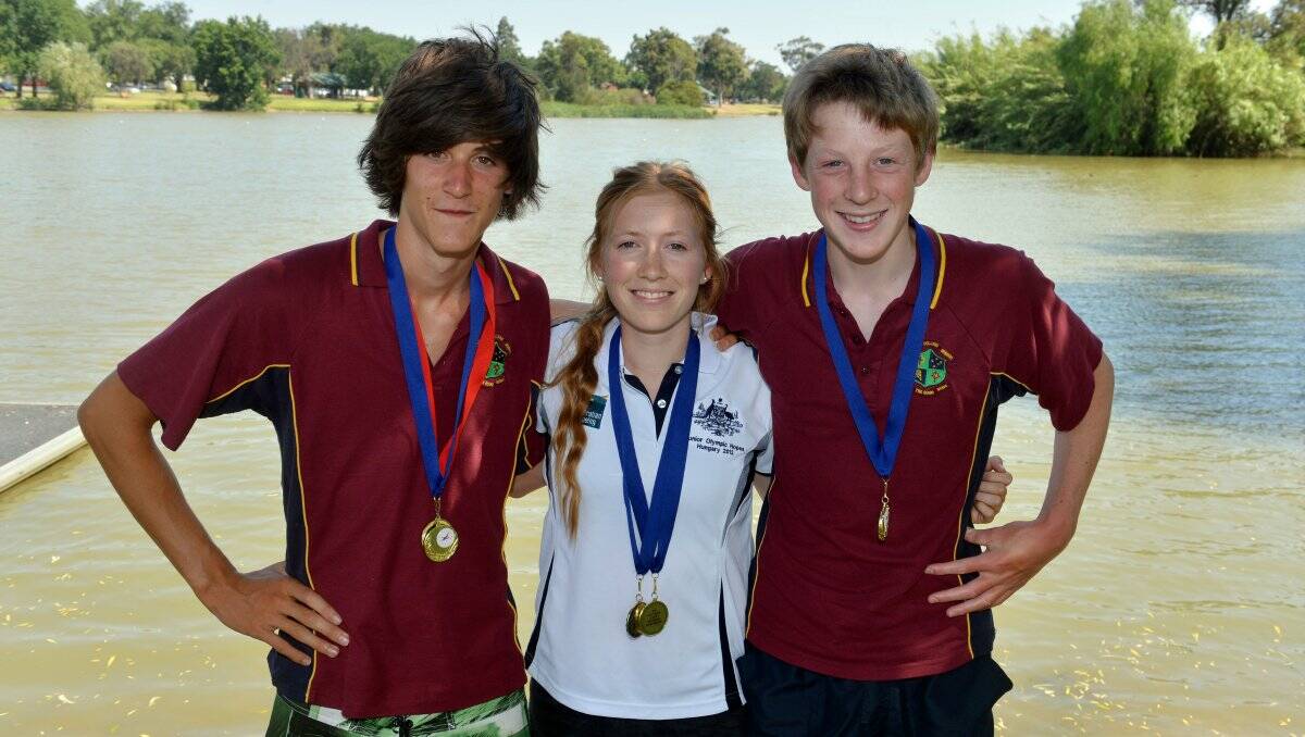 MEDAL HAul: Catholic College Bendigo team-mates Ben McLean, Maddie Batters and Lucas Teasdale paddled brilliantly at the national wildwater schools championships on the Goulburn River rapids at Eildon. Picture: BRENDAN McCARTHY 