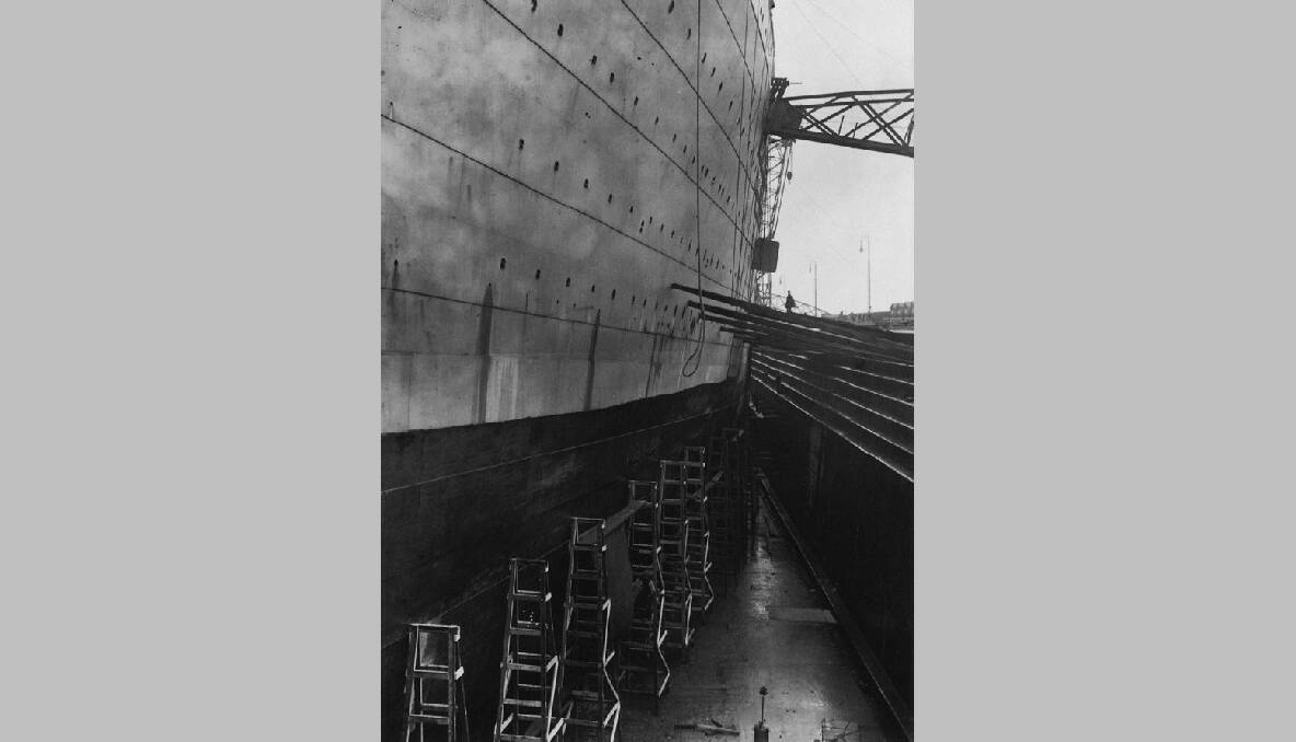 The ill-fated White Star liner, Titanic, in dry dock at the Harland and Wolff shipyard, Belfast, February 1912. Photo by Topical Press Agency/Hulton Archive/Getty Images