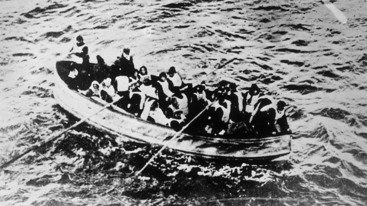 Survivors of the 'Titanic' disaster in a crowded lifeboat. Photo by General Photographic Agency/Getty Images