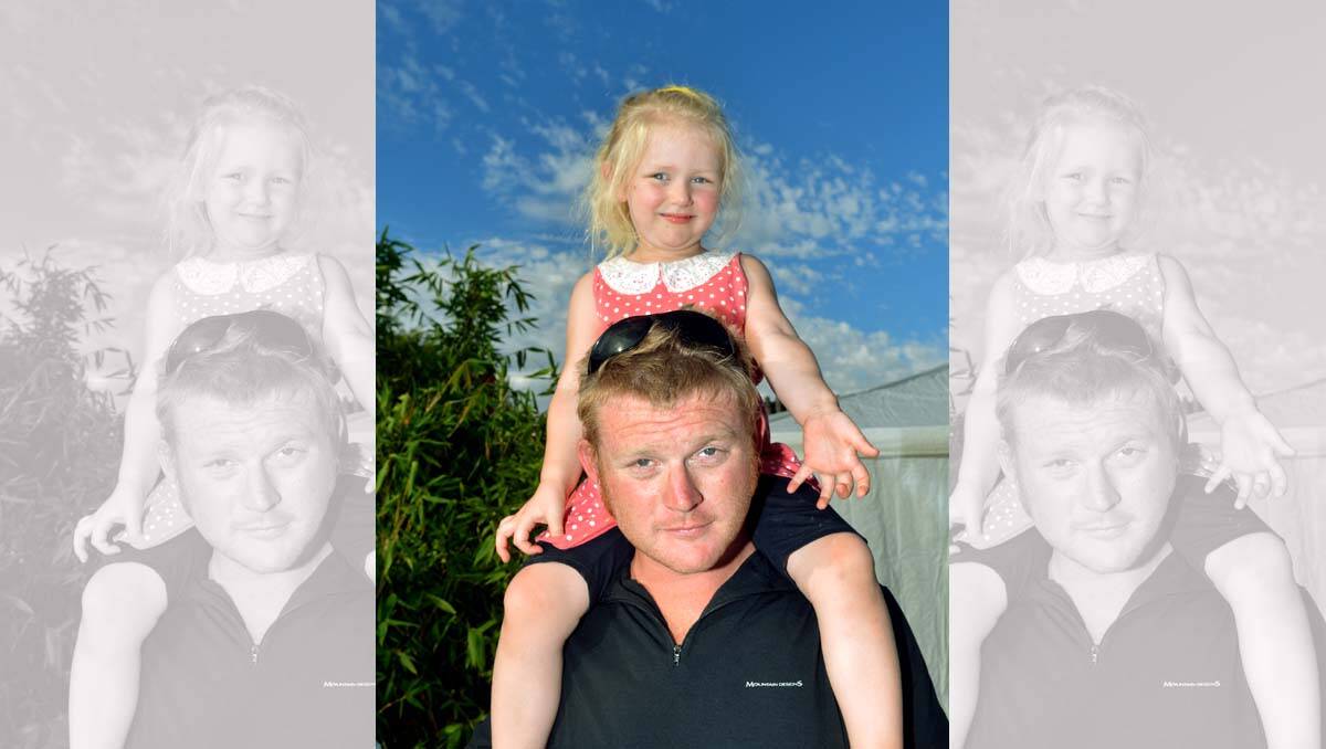 Chinese New Year celebrations at the Dai Gum San precinct. Brad and his daughter Sage Fitzgibbon. Picture: Julie Hough