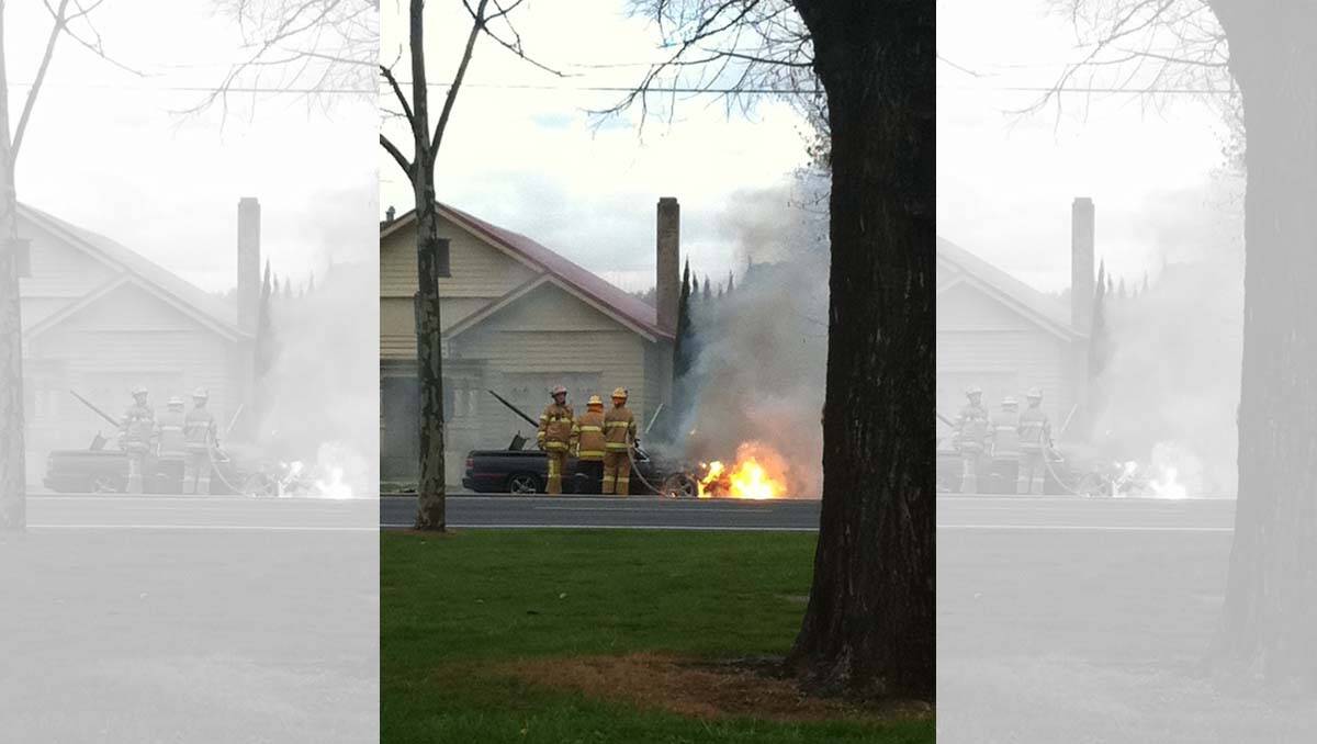 Addy reader Deb snapped this pic of the car fire on her phone and sent it in via the Addy's iPhone app. 