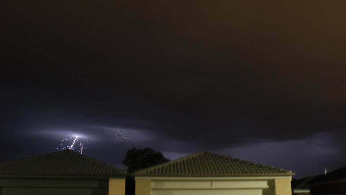 Lightning over Evergreen Waters, looking towards Epsom. Picture: Darren Logan