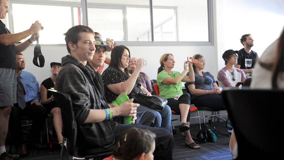 Fans watch as Grinspoon's Phil Jamieson performs at Bendigo headspace. Picture: Jodie Donnellan