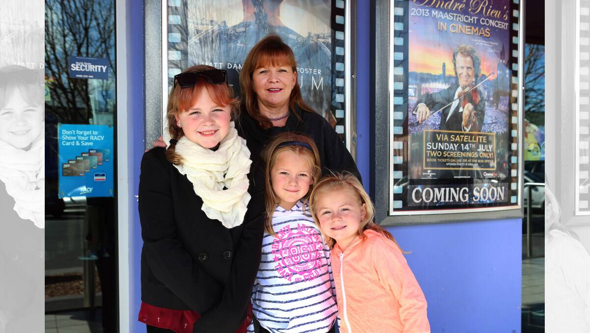 Bendigo cinema, business is booming during the school holidays. Grandmum Dianne Parsons with Jordan 11, Dione 7 and Maegan 5 off to see monsters university. Pictures: Peter Weaving 