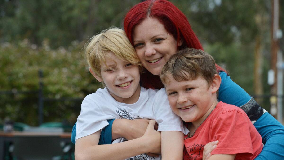 fun times: Mez Whittle with children Issac, 11, and Cooper, 7.  Picture: Brendan McCarthy