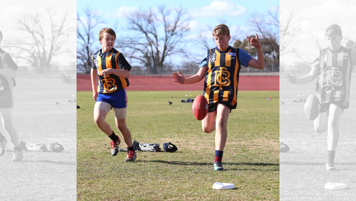 Holiday footy clinic at Tom Flood Centre. Tyson Tresize and Nathan Vincent kicking. Pictures: Peter Weaving 