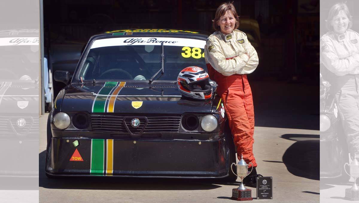 SKILLED DRIVER: Susan Pignataro with some of the recent trophies she has won in the family’s 1983 Alfa Sud. Picture: Brendan McCarthy