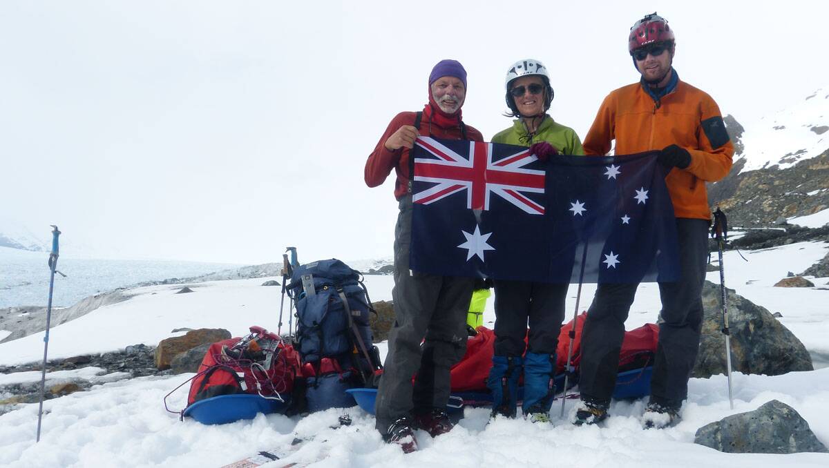 Linda, Rob Rigato and Kerryn Wratt unveil the Australian flag in Argentina. Picture: Supplied