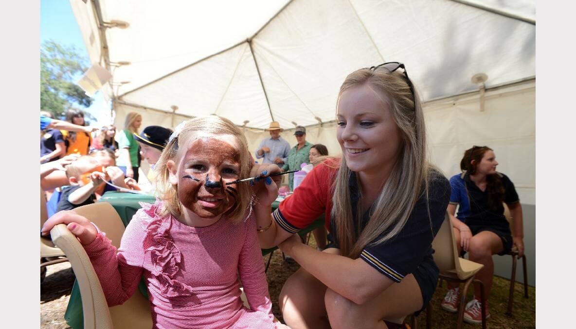 Australia Day celebrations at Lake Weeroona. Monro Mai gets her face painted by Lauren Vanderleest. Picture: Jim Aldersey