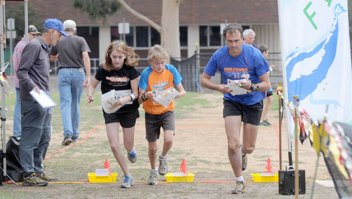2013 Bendigo Easter Festival. National Orienteering League. Kellie, Oliver and Andrew Martin from Perth. Picture: Jodie Donnellan