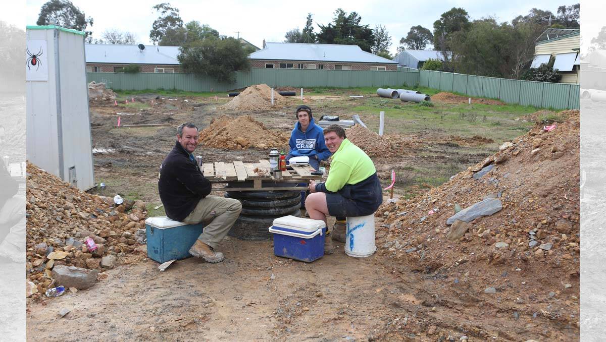 Duncan Murley, Jack Forder and Tom Elliott from Haughton Plumbing take a lunch break at a building site in Marong Road in West Bendigo. Picture: Peter Weaving 