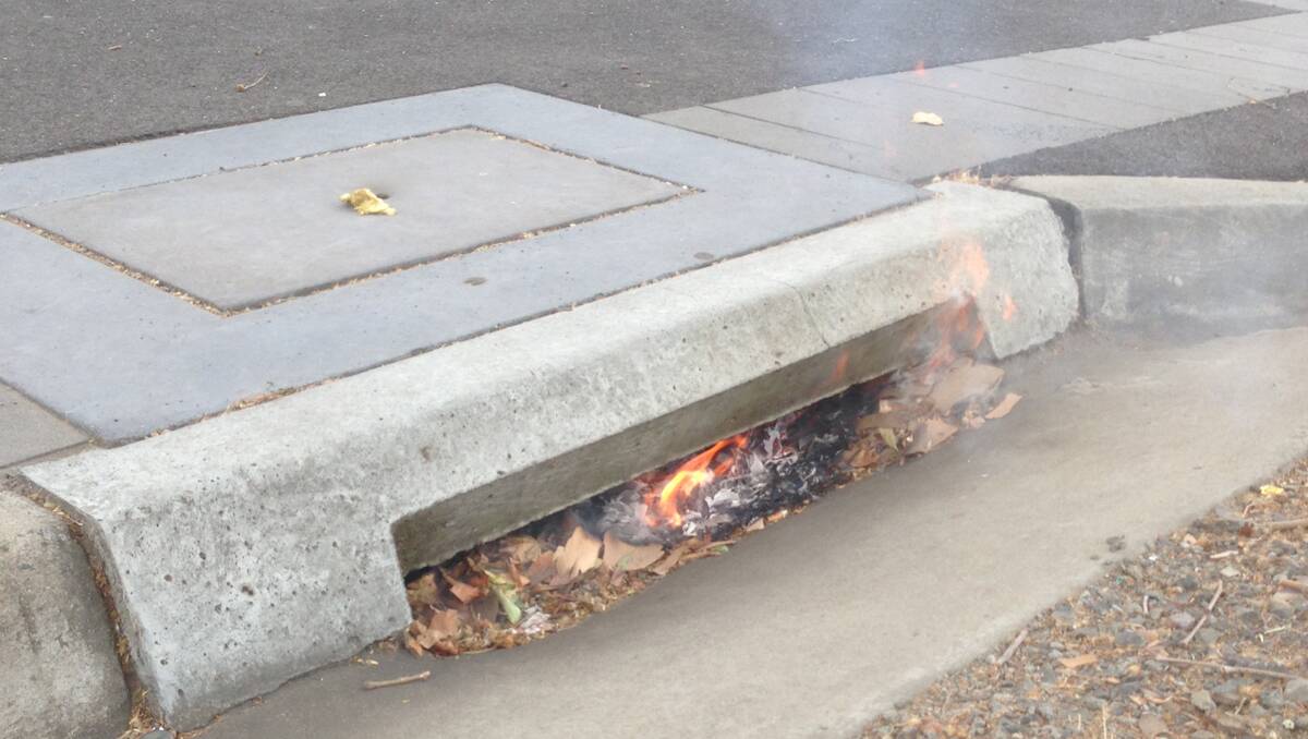 The drain on fire earlier today. Picture: Josh Fagan
