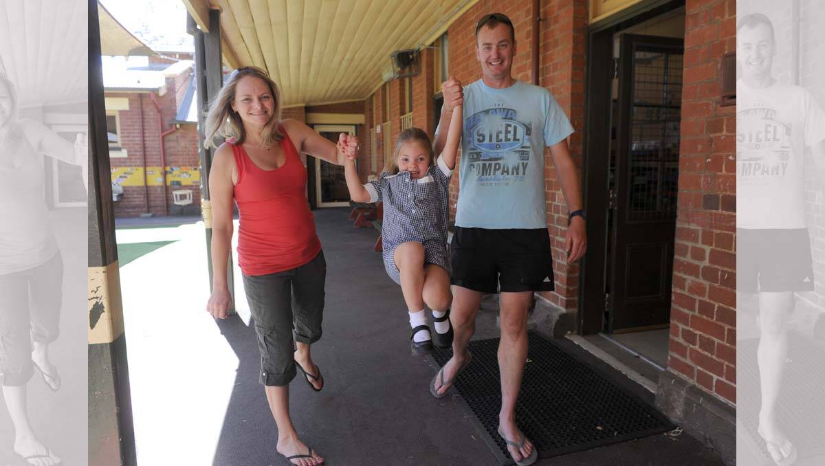 Golden Square Primary School prep student Karla Donegan with mum Ange Dalton and step-dad Ben Penrose. Picture: Jodie Donnellan