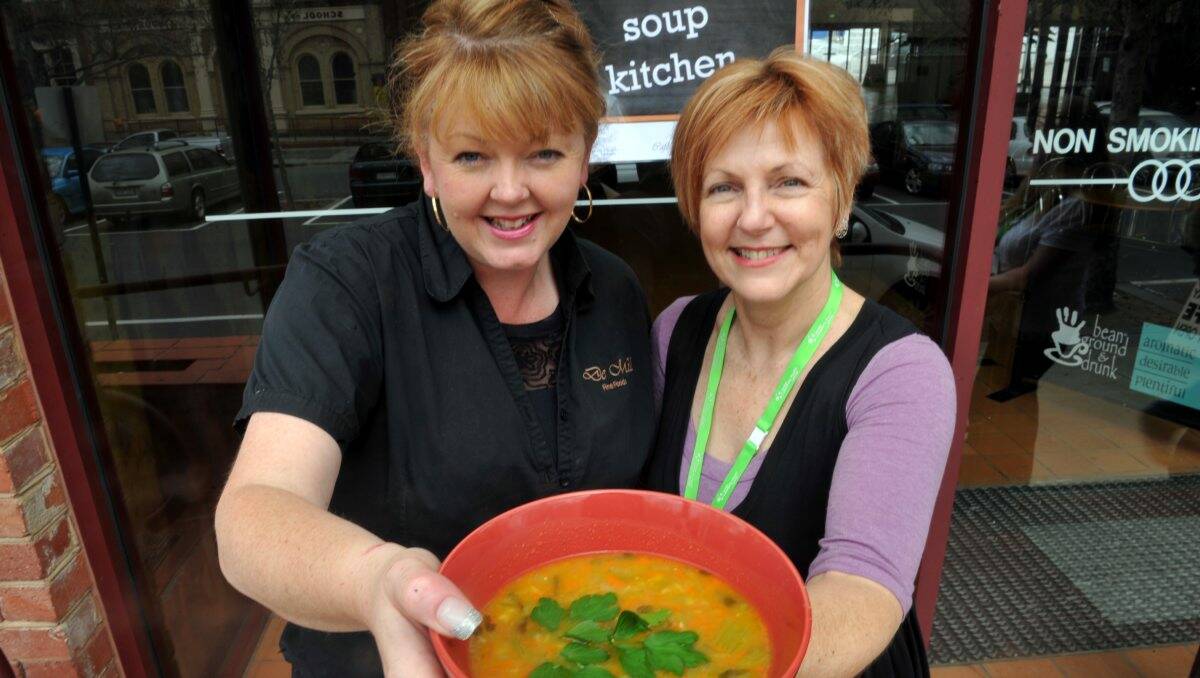 HELP: Liz Skipper, of Cafe De Mill, and Kim Sykes help run a soup kitchen.