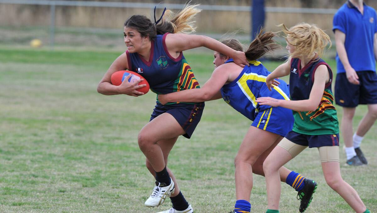 Youth girls footy action. BSE Dragons v CCB. Picture: Peter Weaving