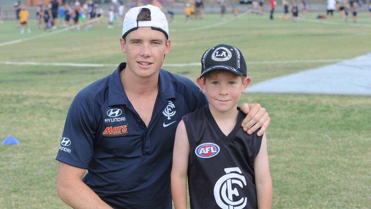 Carlton super clinic at the QEO. Andrew Collins with Liam Yates. Picture: Jodie Donnellan