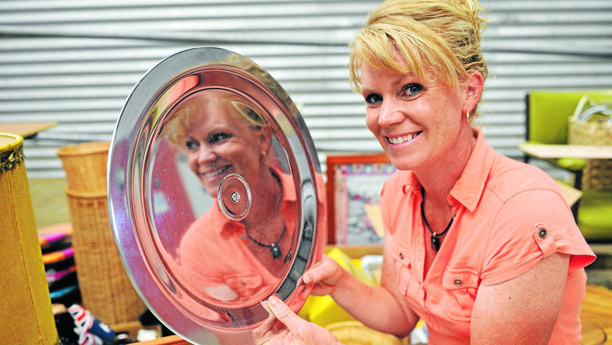 Jodi Dobson sorts through some wares for Rochester’s town-wide garage sale. Picture: Brendan McCarthy