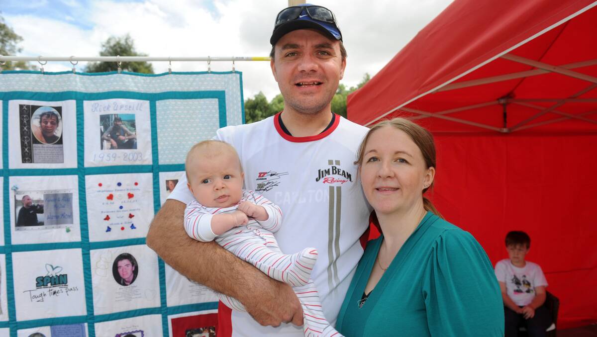 SPAN suicide awareness walk 2013. Karl and Kylie Baker with baby William. Picture: Julie Hough