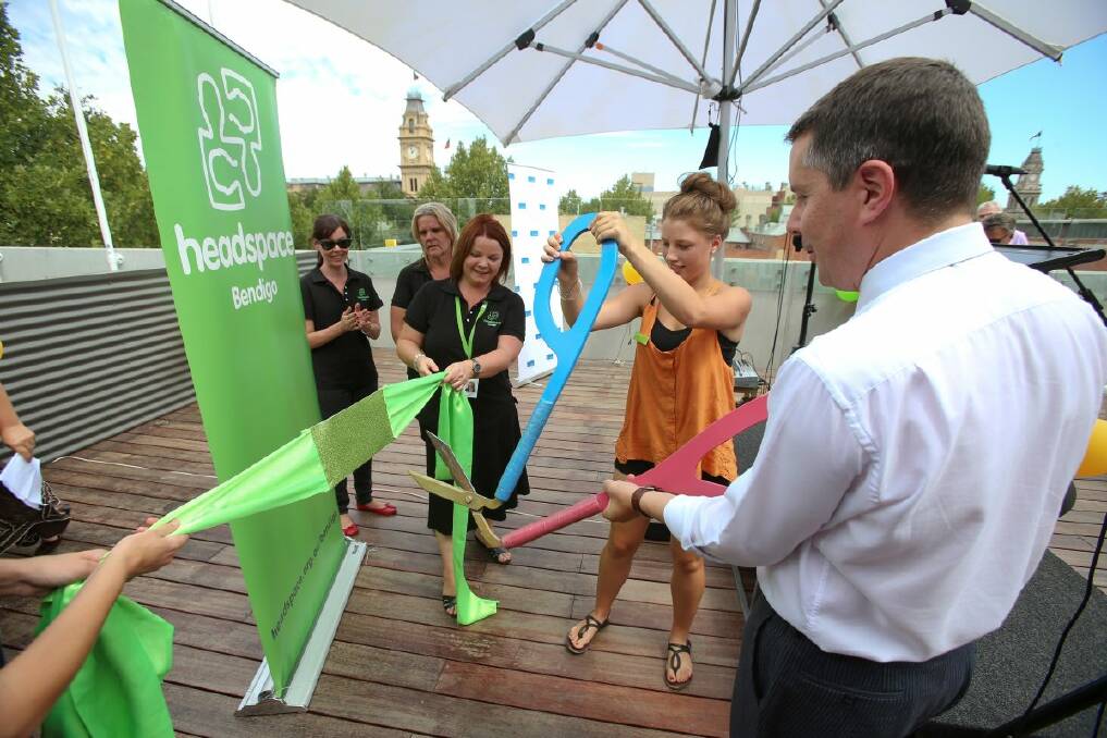LAUNCH: Federal minister for mental health Mark Butler and headspace ambassador Megan Anderson cut the ribbon. Pictures: PETER WEAVING