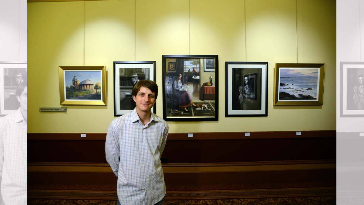 Amie Sacrez with some of his art hanging in the Capital. Picture: Jim Aldersey