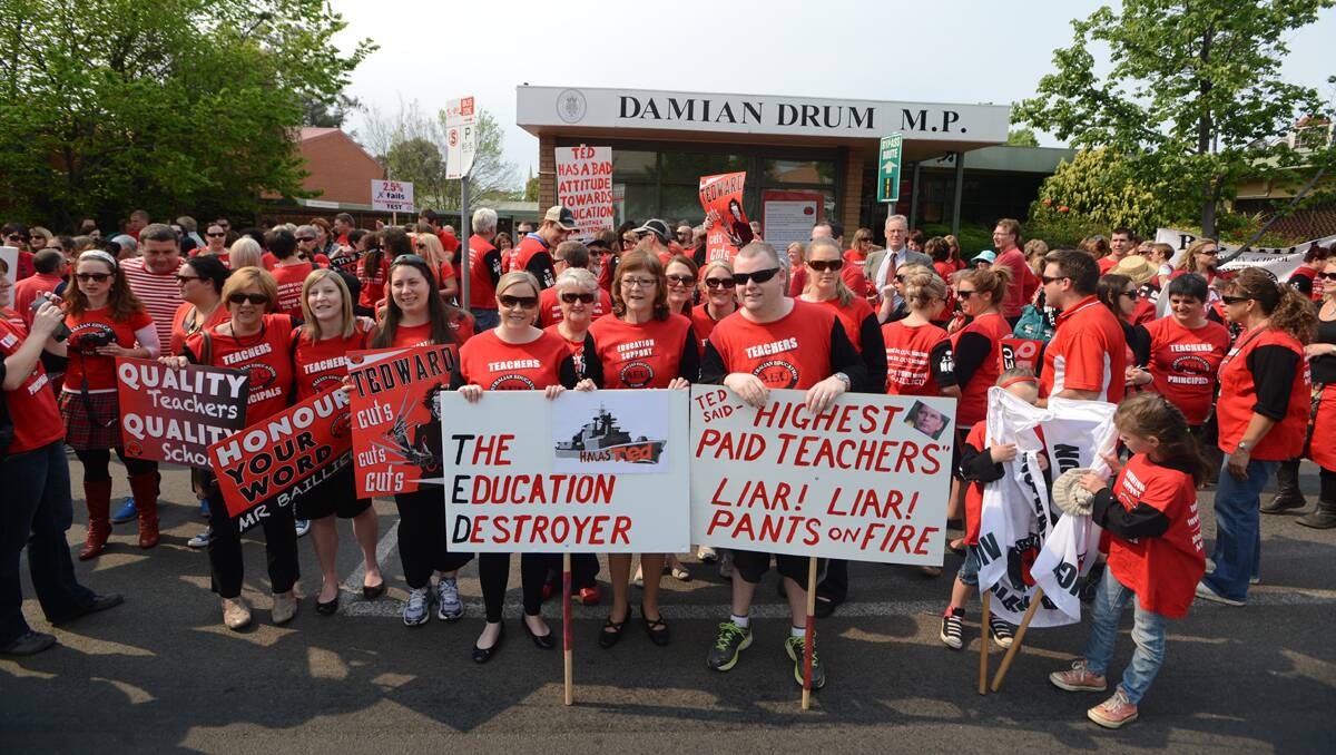 Teachers outside Damian Drum's office this morning. Picture: Jim Aldersey