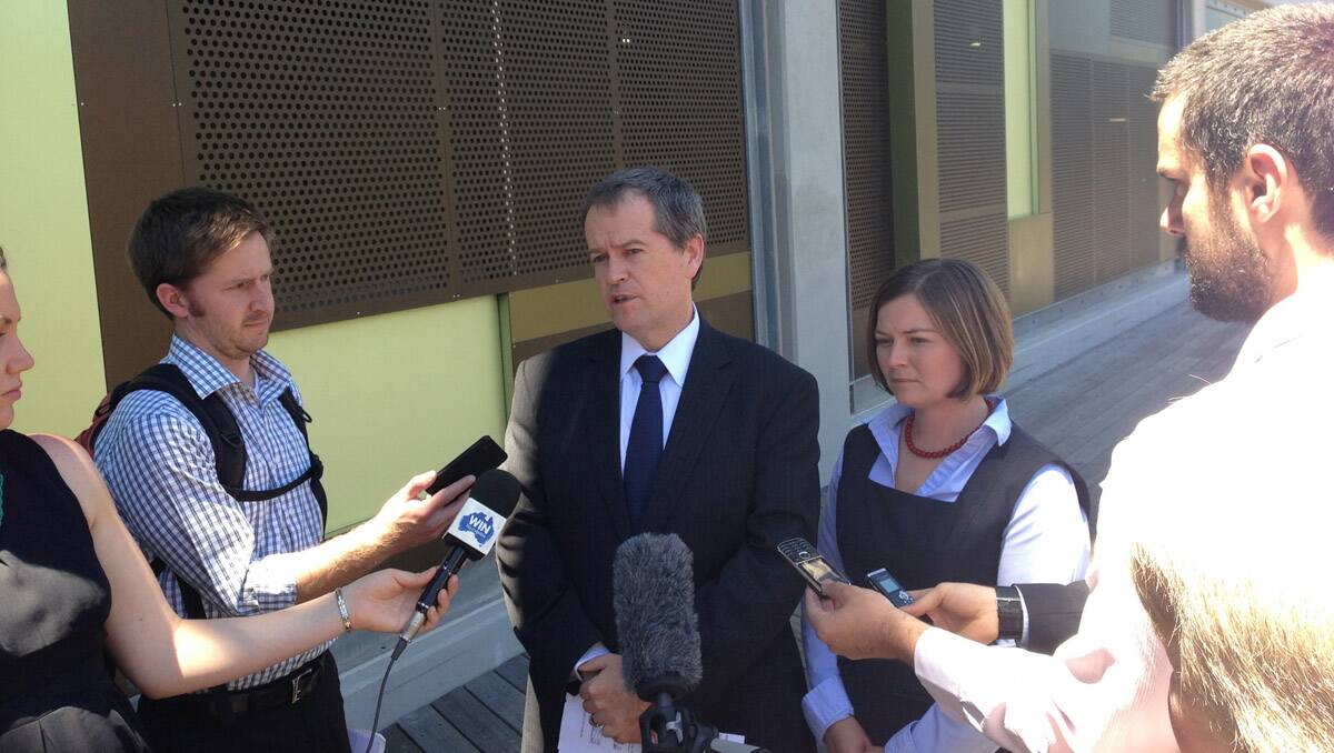 Minister for Workplace Relations, Financial Services and Superannuation Bill Shorten outside Bendigo Bank today.