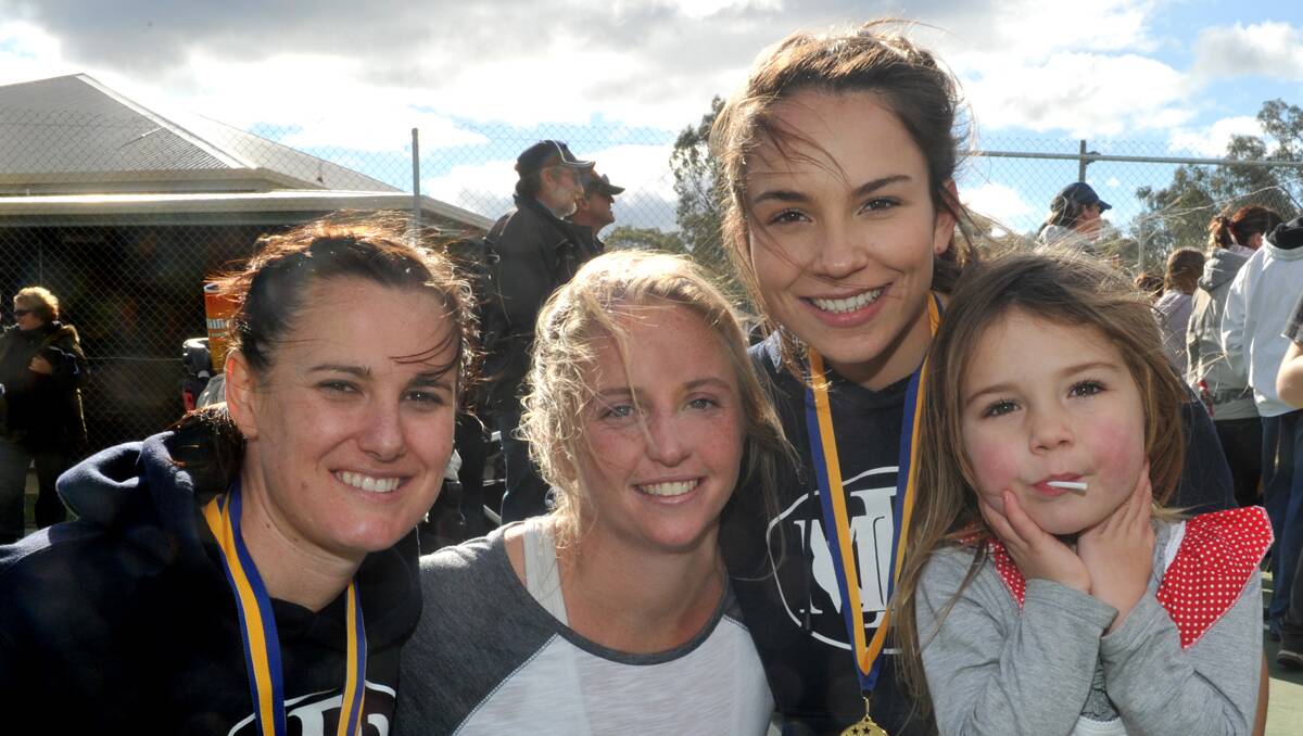 HDFL grand final. Stacey Bell, Susie Coghlan and Krystal and Sebella Lewis. Picture: Jodie Donnellan