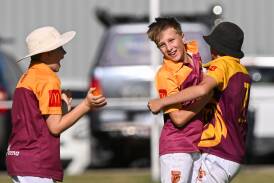 Maiden Gully Marist bowler Tarkyn Ralphs celebrates taking a wicket with teammates on the weekend. Picture by Darren Howe