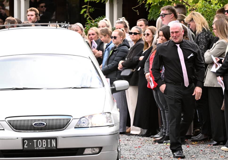 Hannah McGuire's father Glenn at the funeral of his daughter. Picture by Adam Trafford
